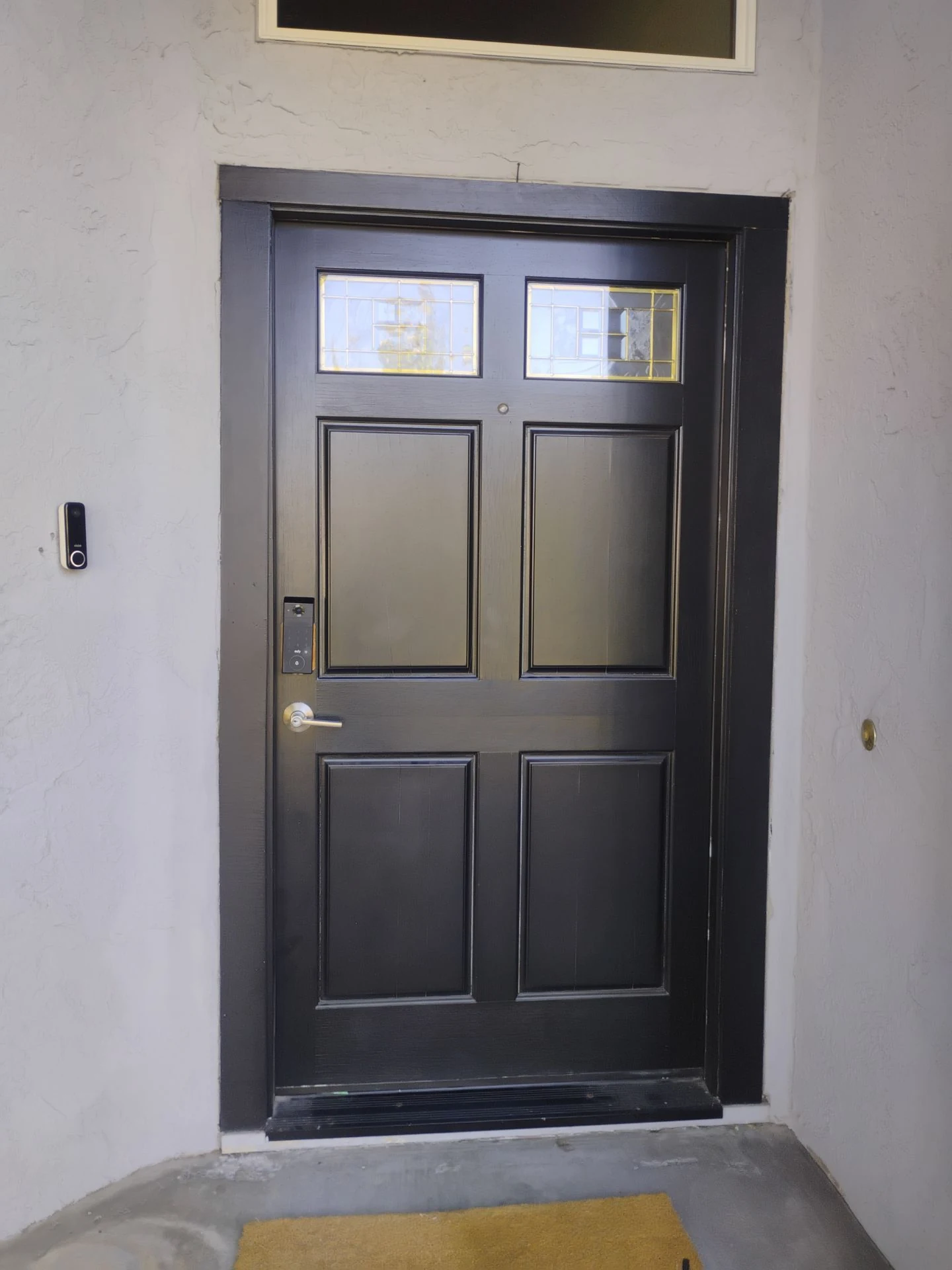 Exterior wood front door affected by seasonal movement in Benicia