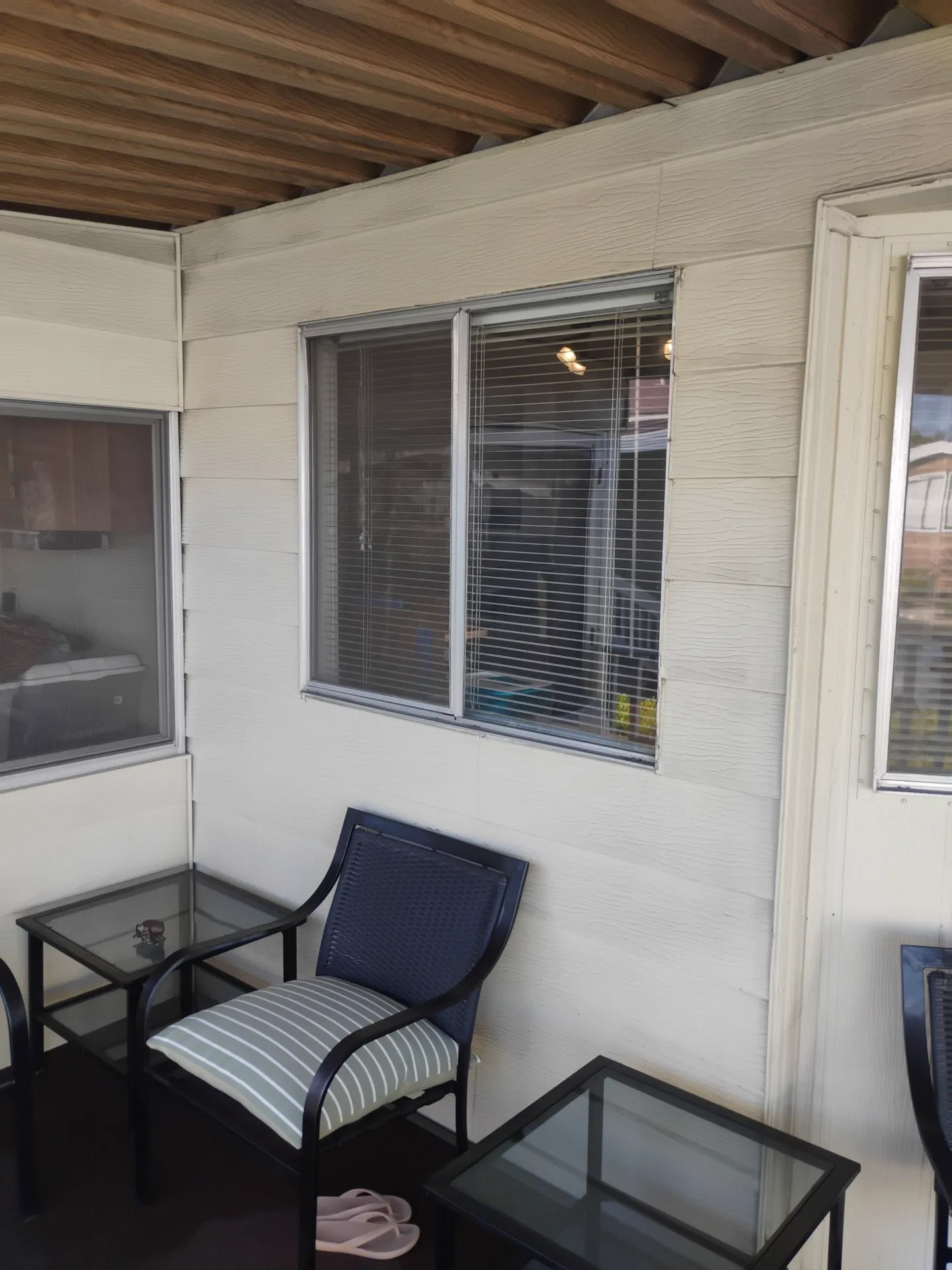 Older aluminum porch windows before replacement in San Jose, CA