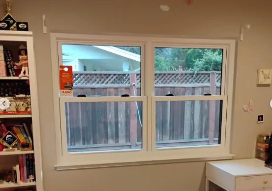 White interior Anlin operating windows installed in a Danville bedroom