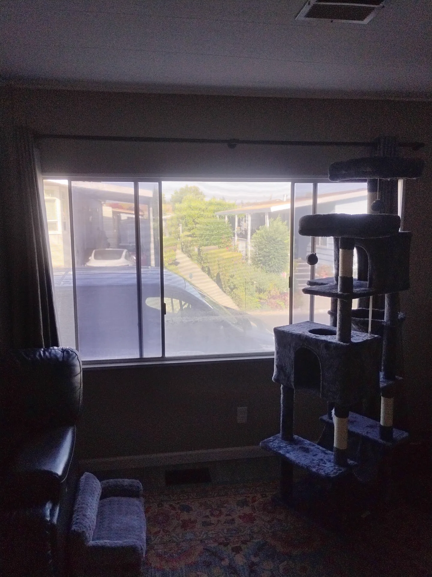 Older aluminum front room window before replacement in San Jose, CA