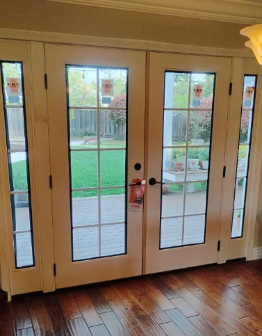 Interior view of completed Therma-Tru French patio doors and divided-glass sidelites