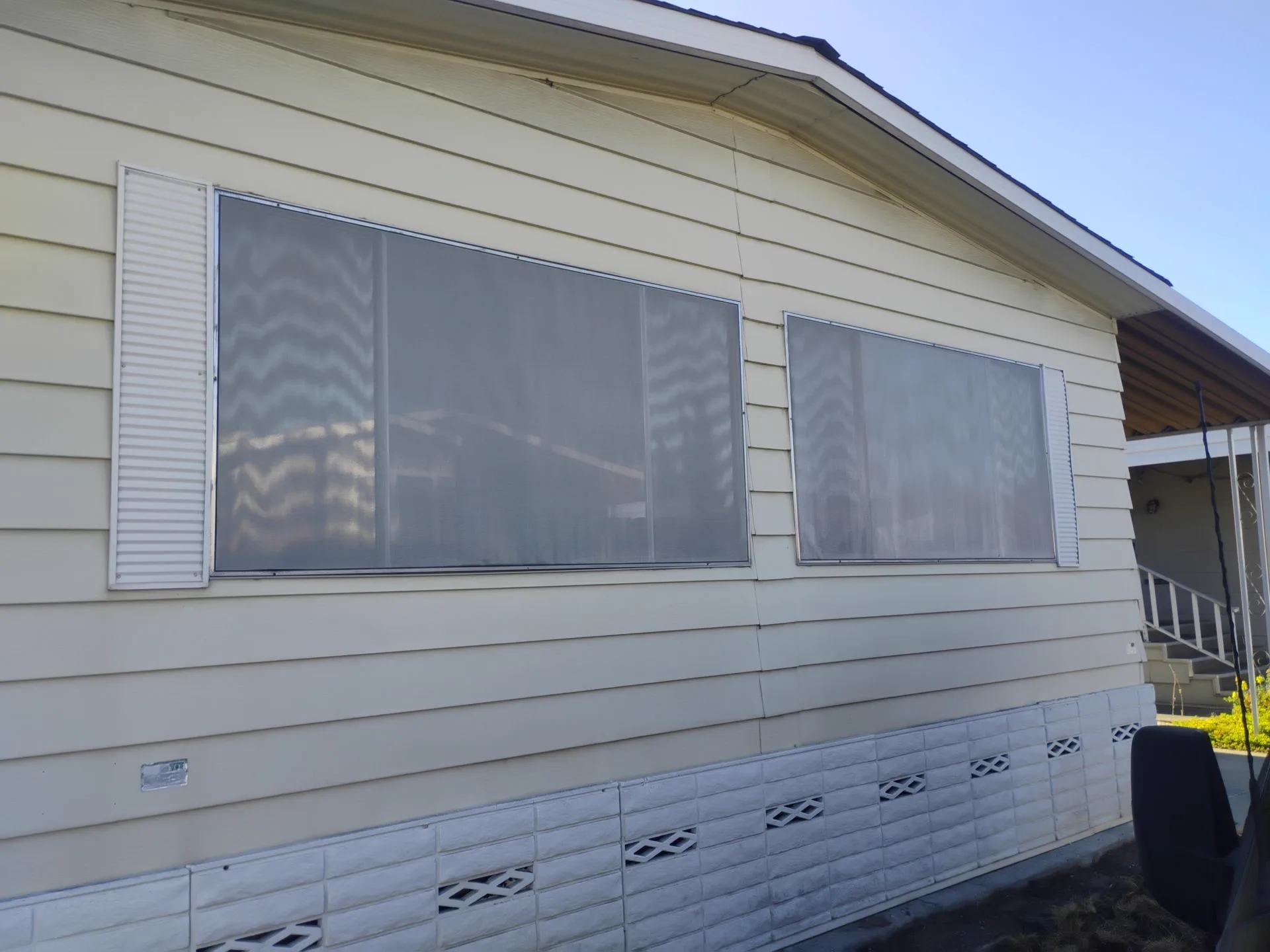 Older wide aluminum front window before replacement in San Jose, CA