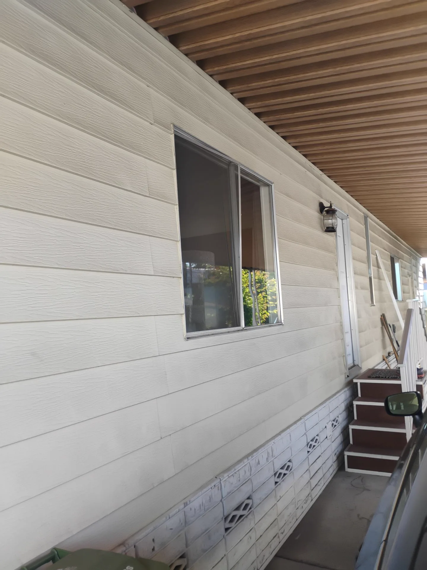 Older aluminum rear window exterior before replacement in San Jose, CA
