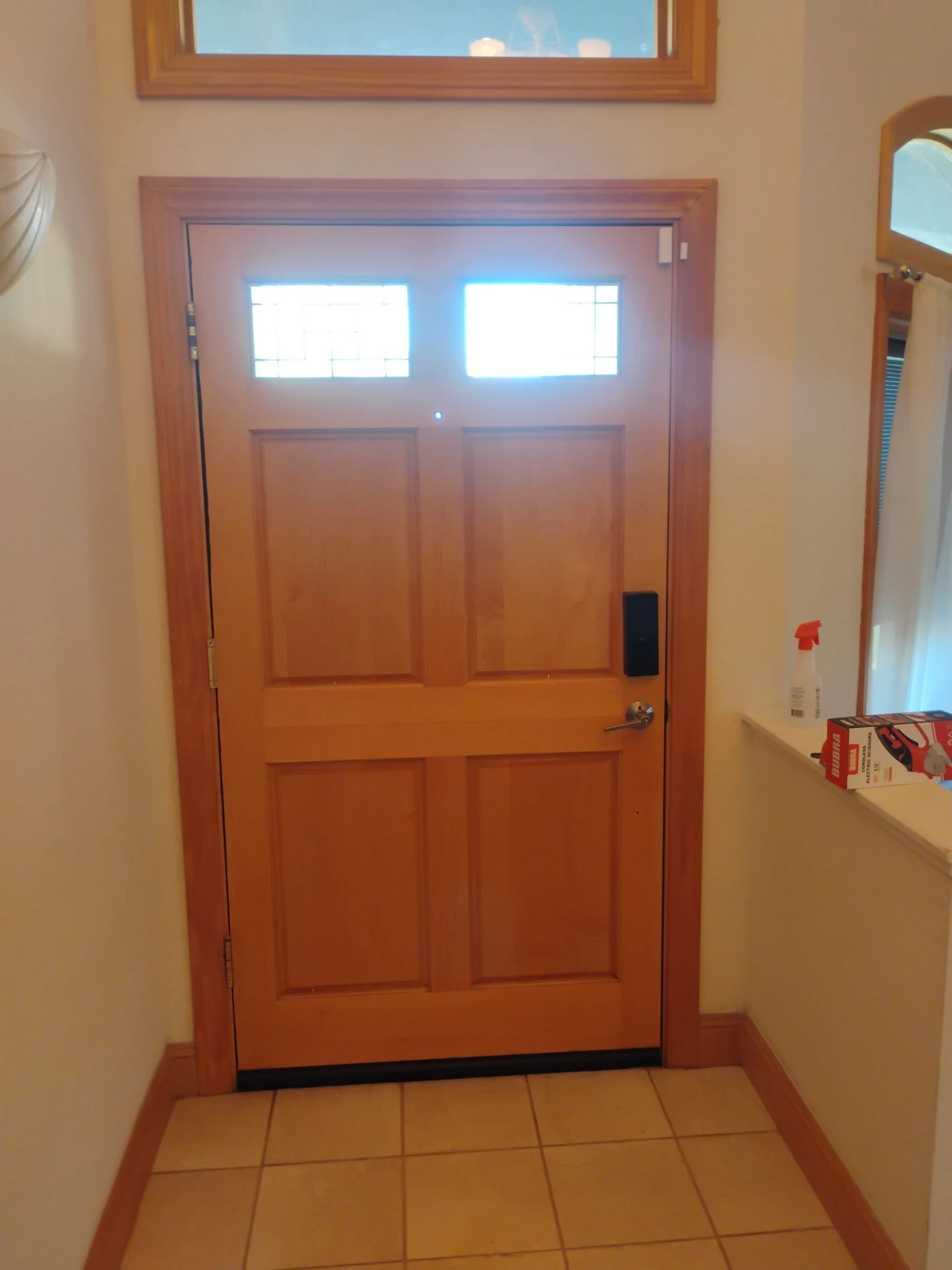 Original natural wood entry door before replacement in Benicia, CA