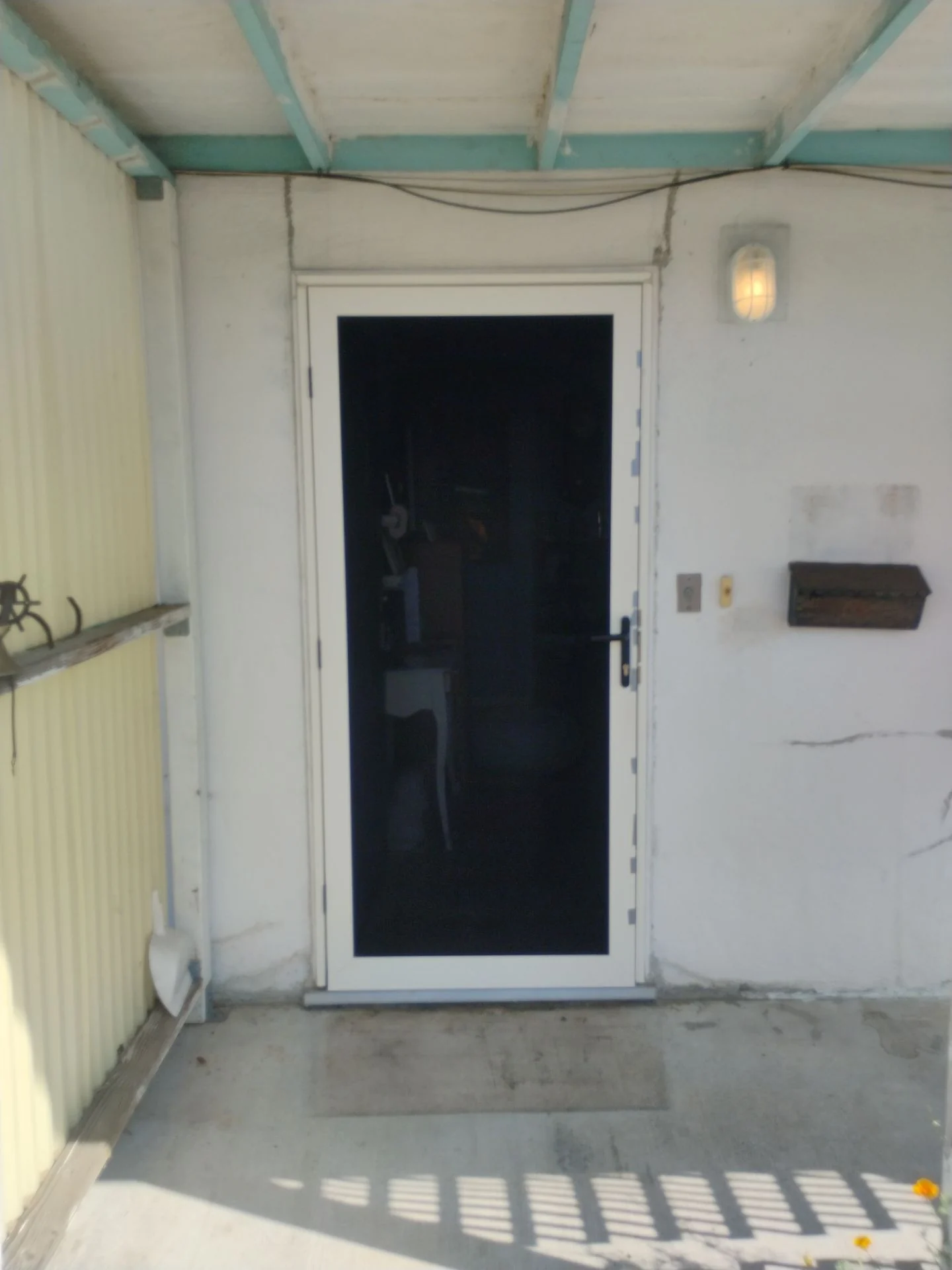 Existing Titan Ultimate security door before replacement
