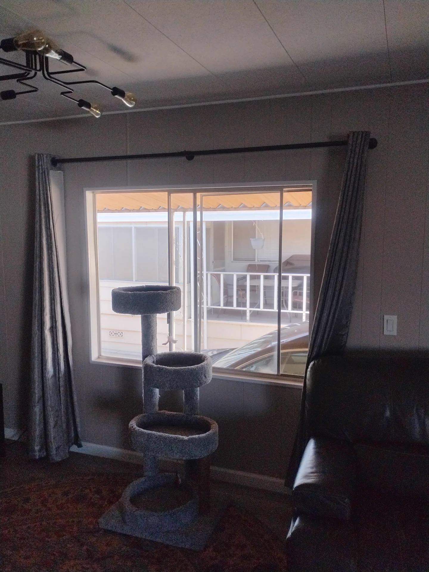 Older aluminum family room window before replacement in San Jose, CA