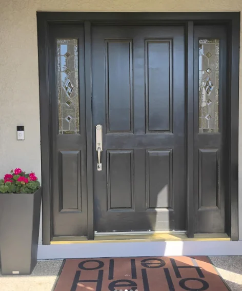 Original wood front door with decorative sidelites before replacement in Larkspur, California