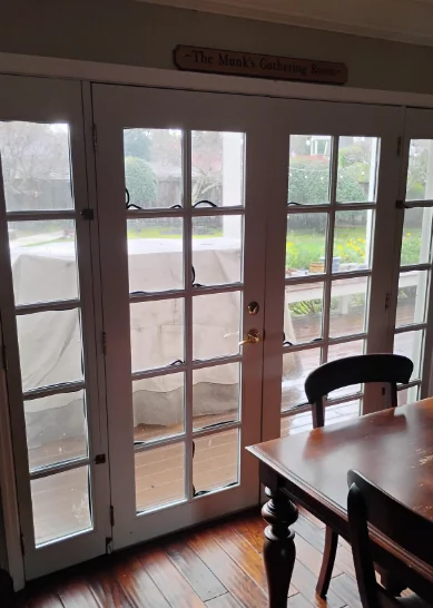 Interior view of the original shrinking wood French doors in a Danville home