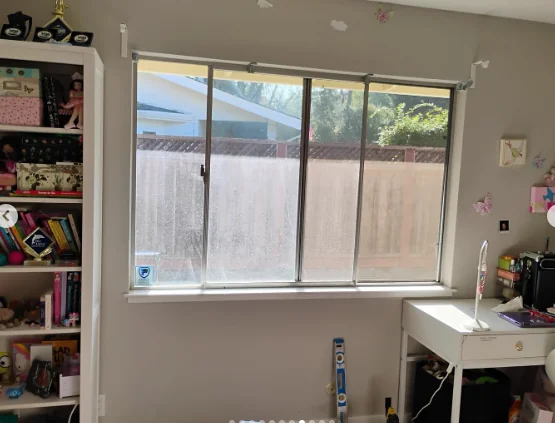 Original aluminum bedroom window before replacement in Danville, California