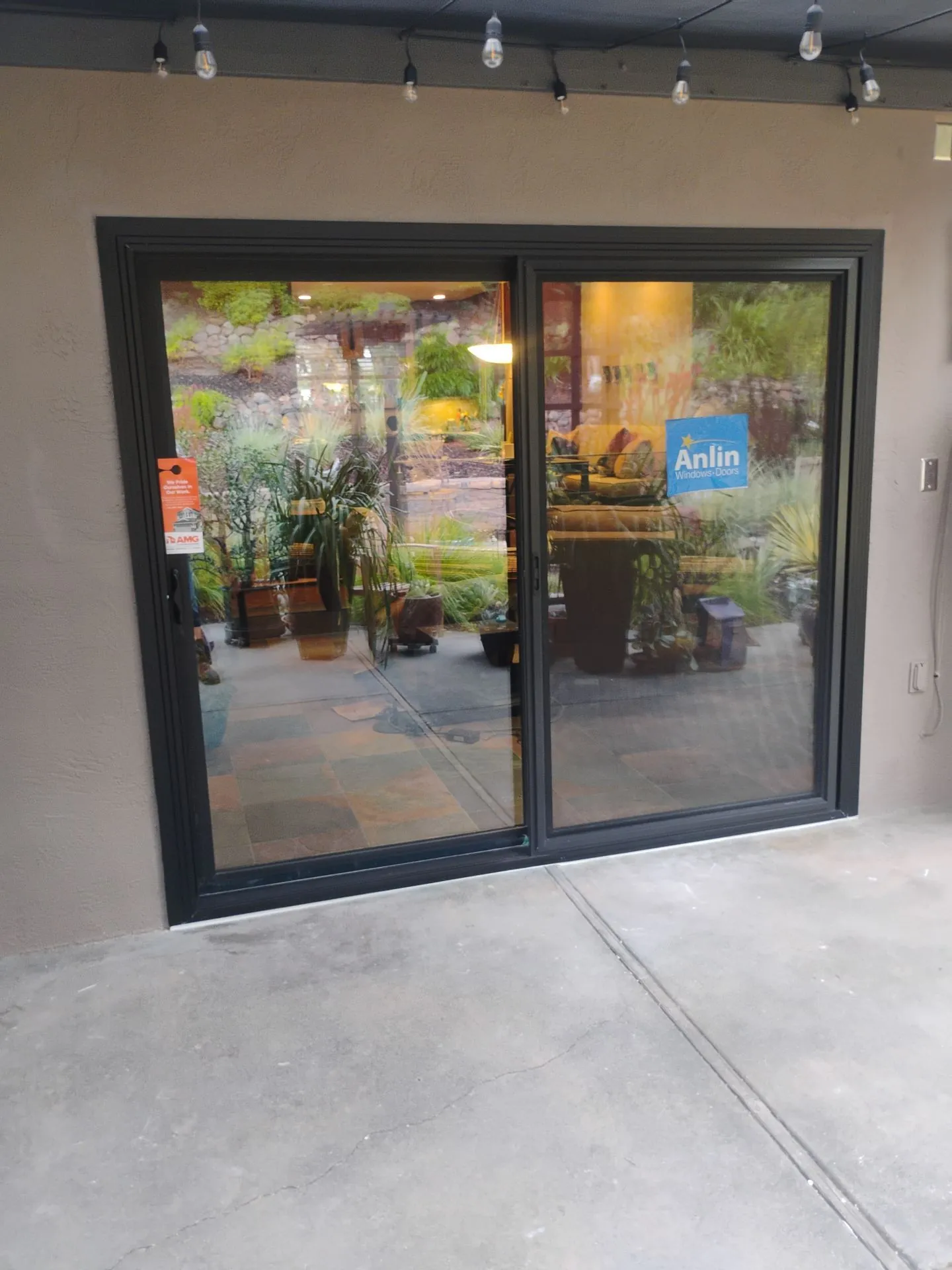 After: Anlin Designer Black slider replacing the old patio door at the second garden-facing opening in Danville, CA