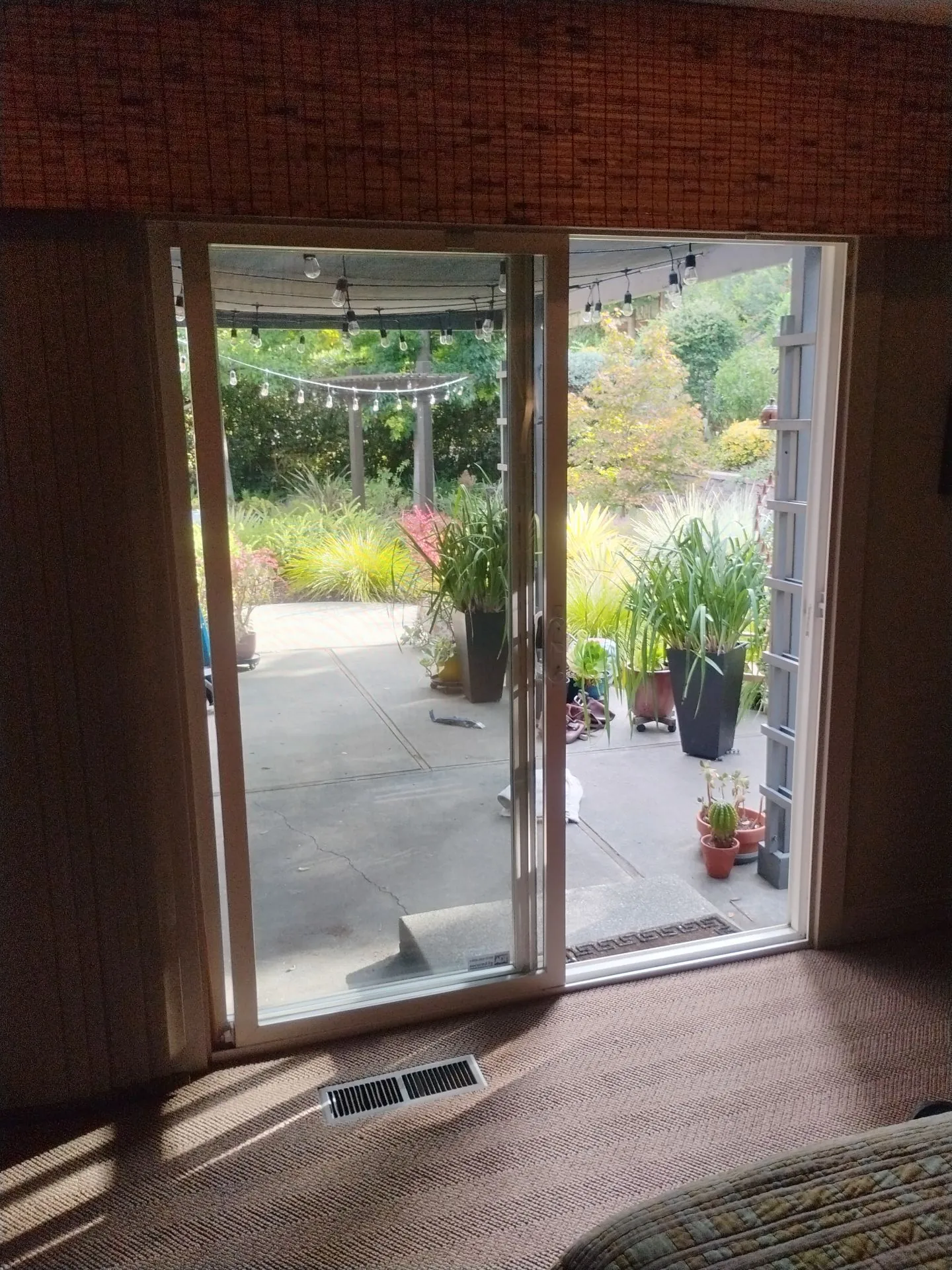 Before: white-frame sliding patio door in the Danville, CA family room prior to the Anlin replacement
