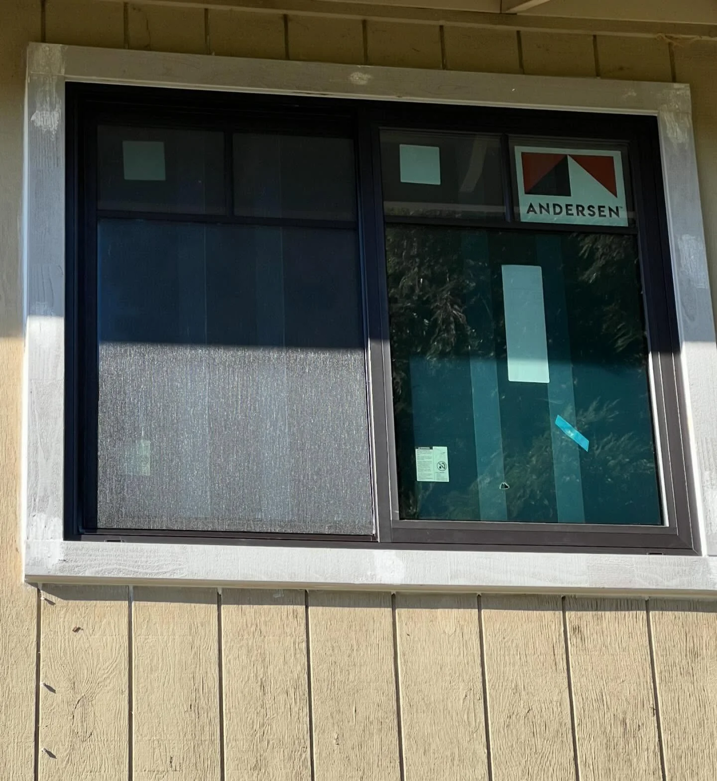 Exterior black Andersen 100 Series replacement window on a Danville CA home