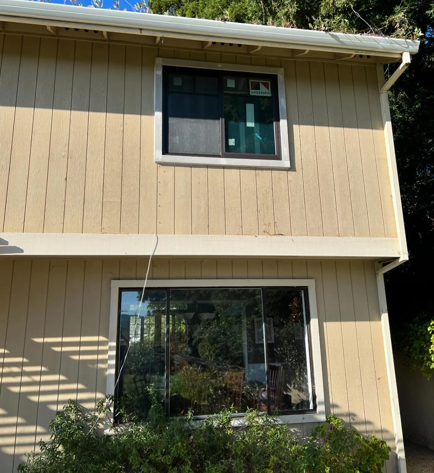 Danville California home exterior with black Andersen 100 Series replacement windows