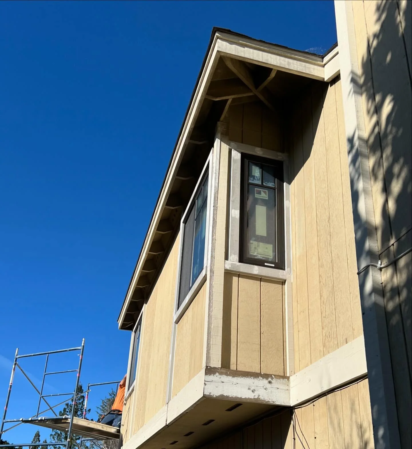 Narrow black Andersen 100 Series window installed on Danville California home exterior