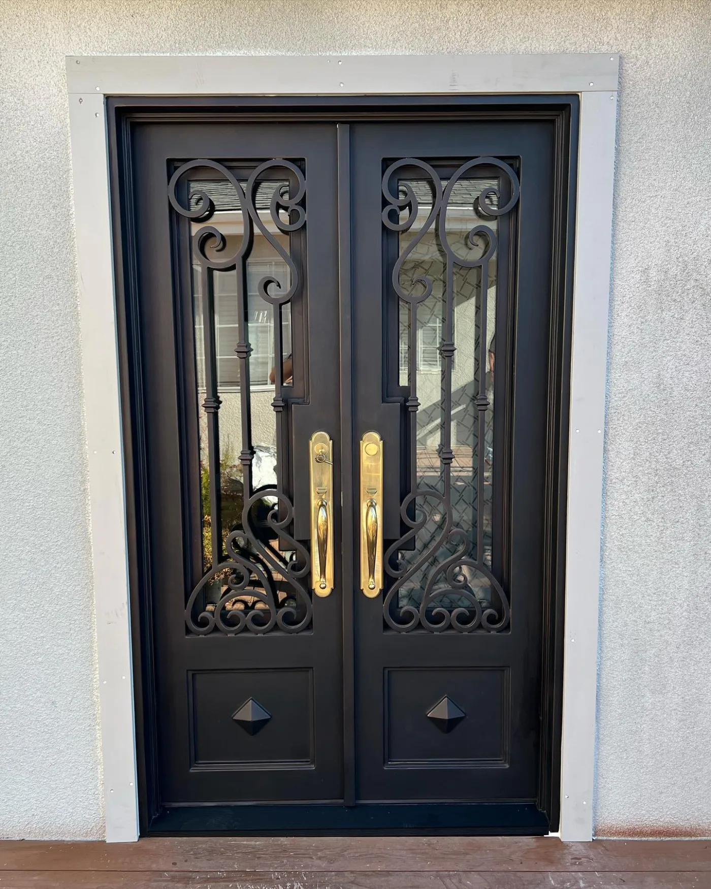 Custom Double Iron Exterior Door Installation