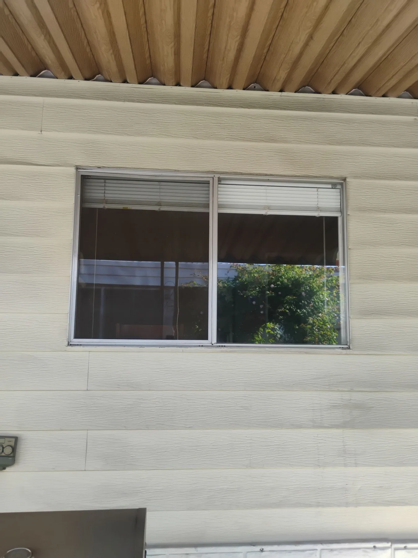 Exterior white replacement window on a San Jose home