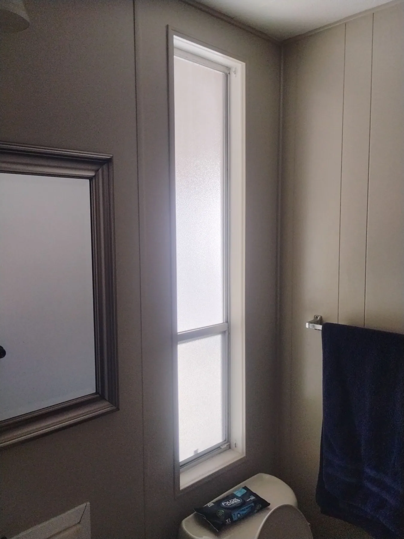 Interior replacement window with clean white frame