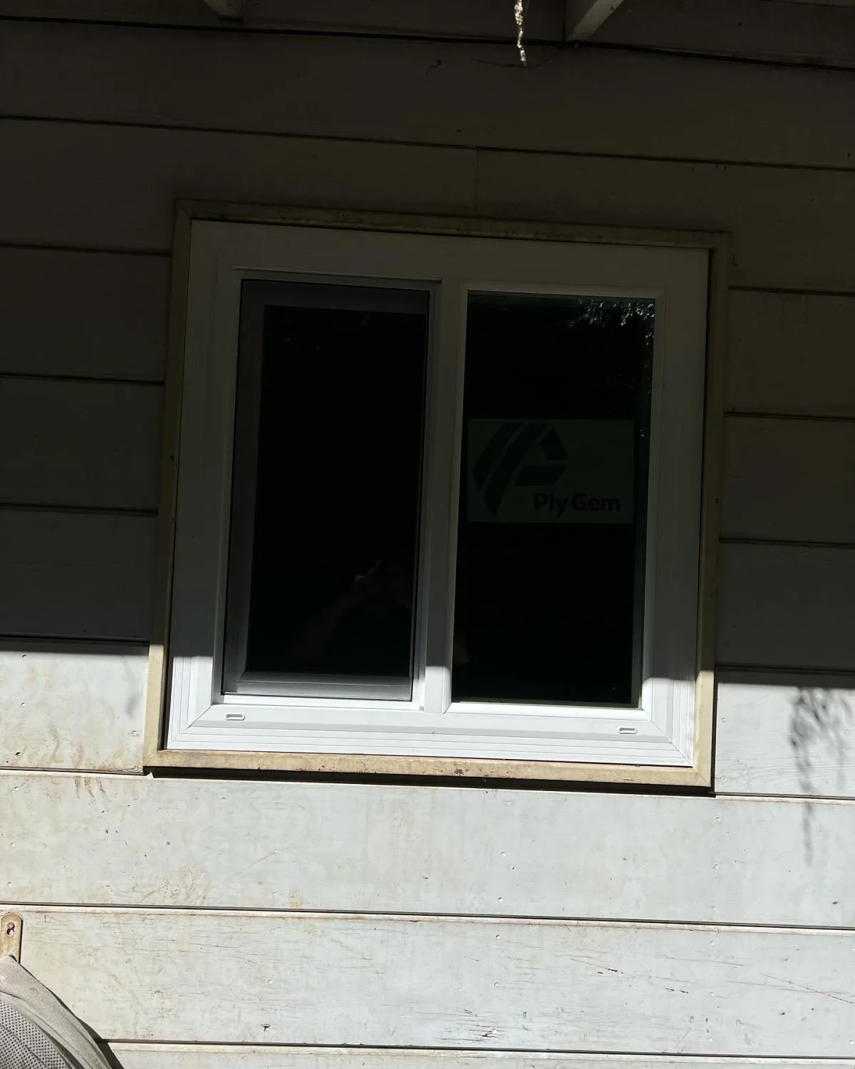 Finished PlyGem vinyl slider window installed on an Oakland home