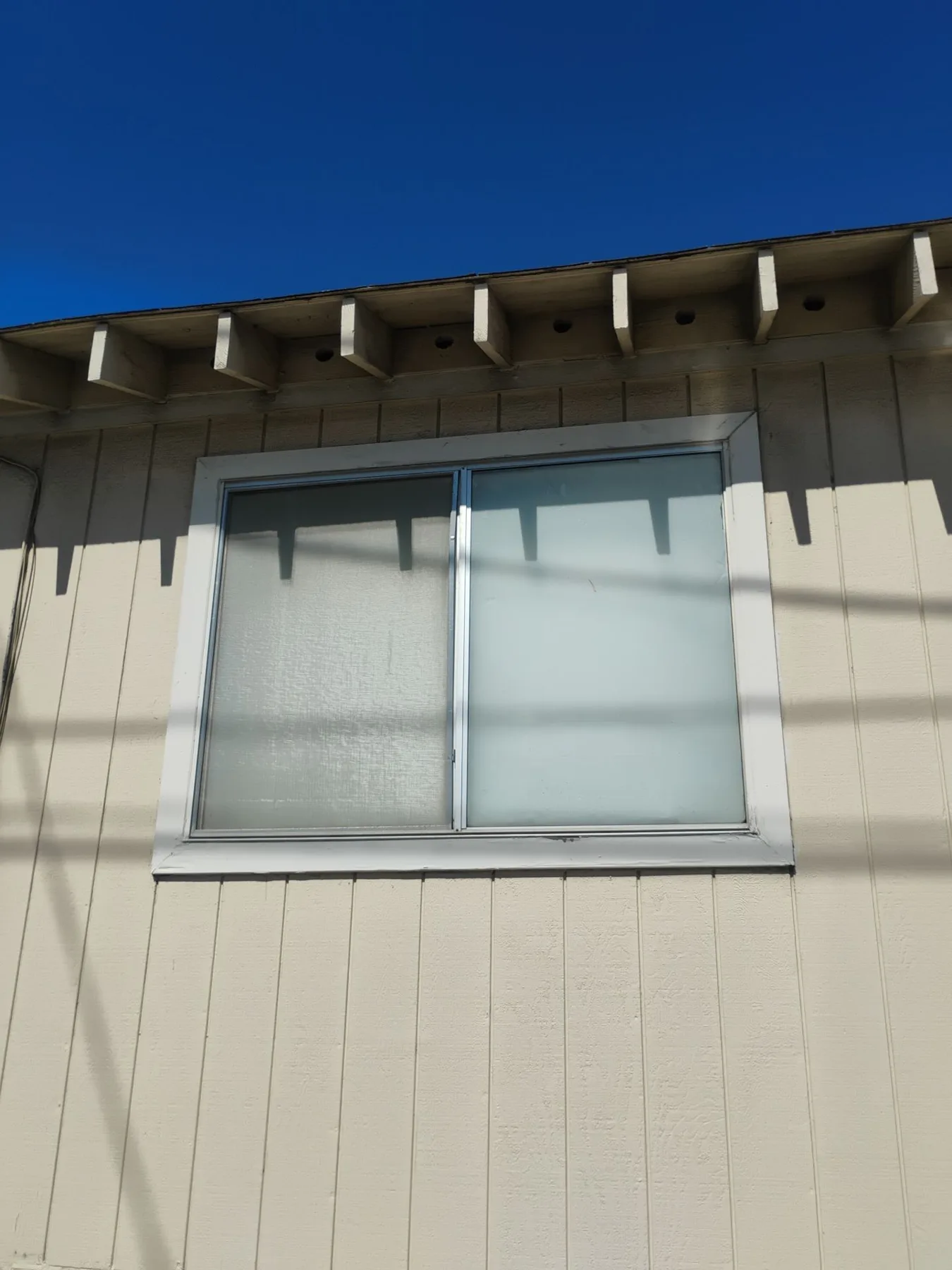 Before and after window replacement in Richmond CA — original older windows before replacement