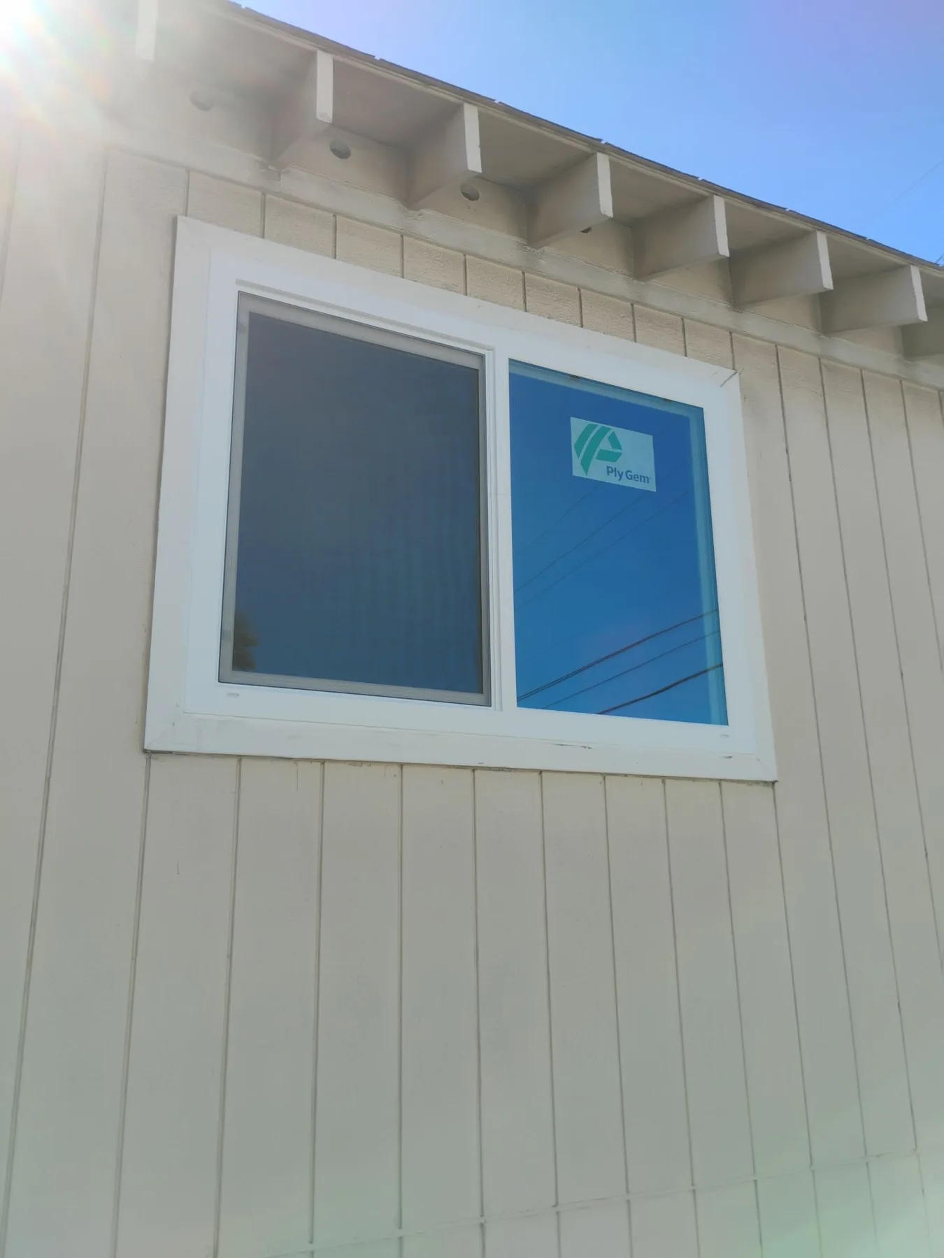 White PlyGem window installed on Richmond home exterior