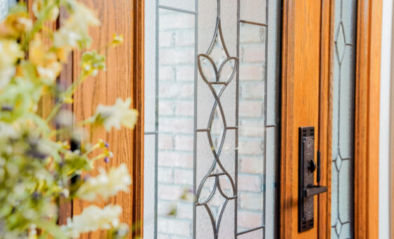 Signet® Knotty Alder 002CP entry door in Espresso with Panel Planks, hinge straps and clavos